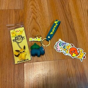 2 Pokemon key chains and stickers